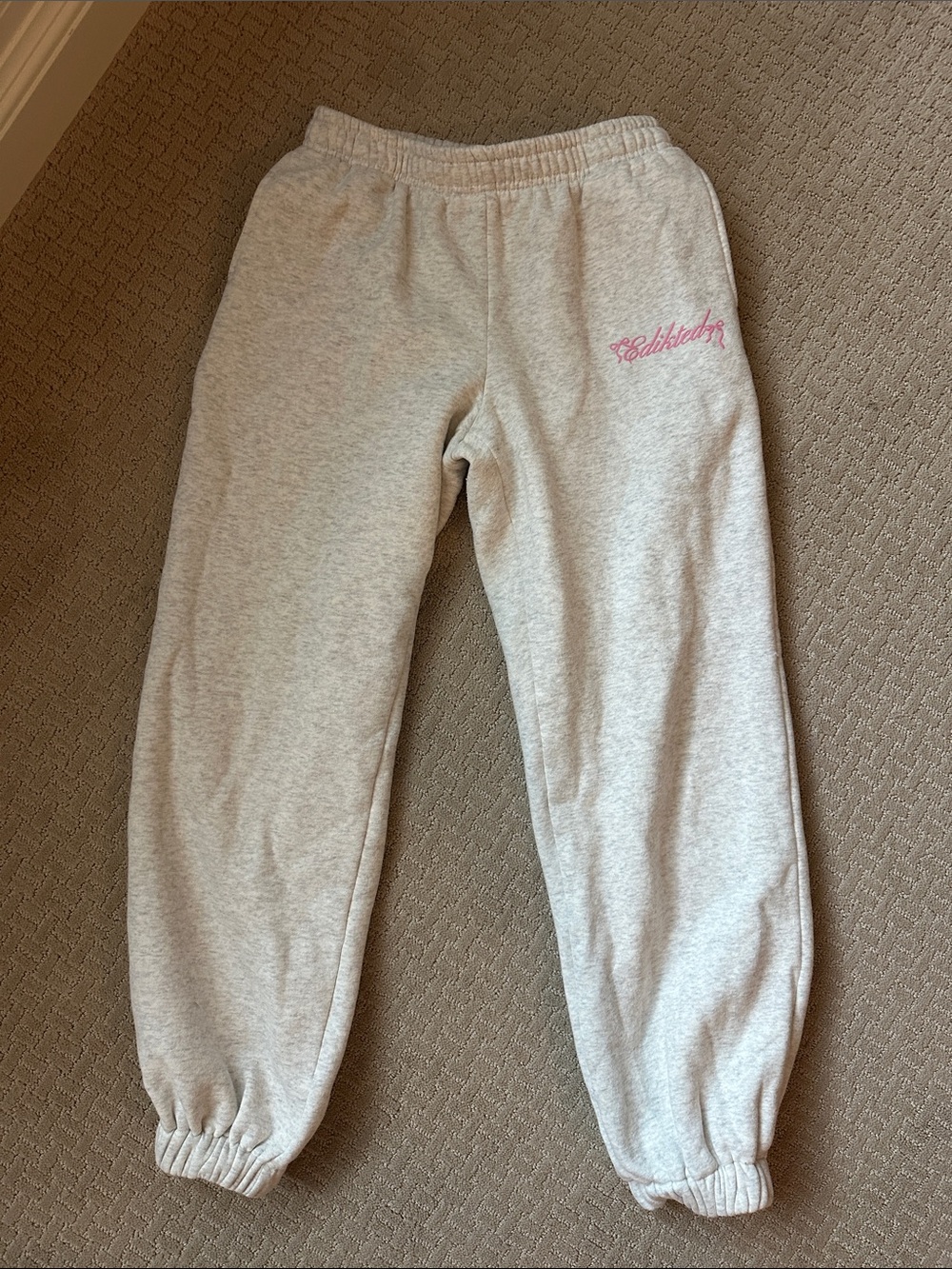 Edikted Light Gray Sweatpants with Pink Script Logo